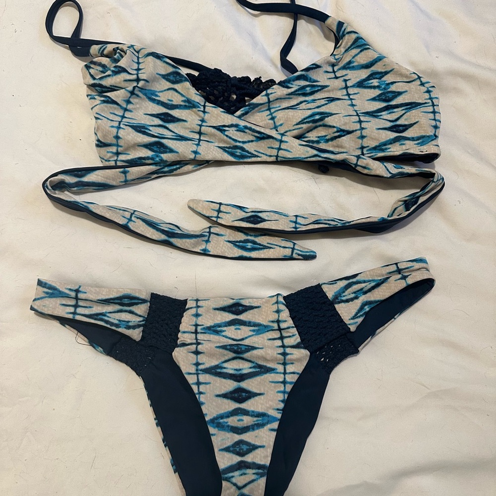 Frankie’s Bikini’s wrap around thong bikini set in medium.